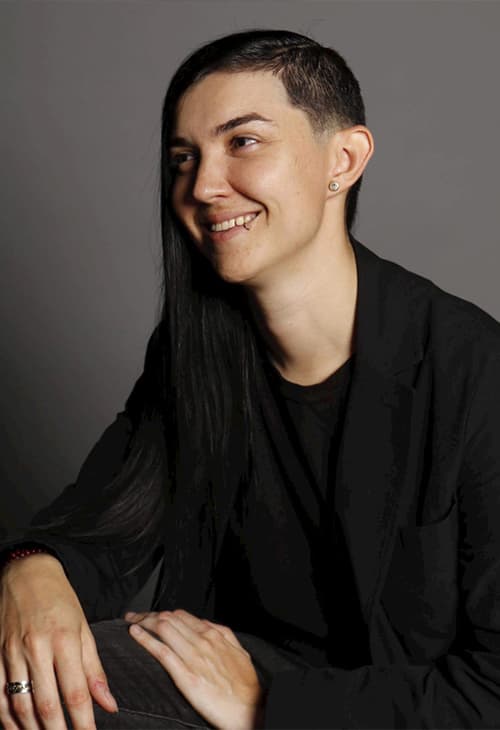 headshot of associate dj, DJ Ash