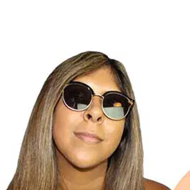 DJ Nikki Duran in sunglasses holding two vinyl records